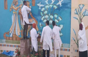 Faculty of Archaeology Students Decorate 2 Murals on Airport Entrance, Sahary Road